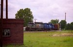 CSX 8177 leads a train across Bridges Street